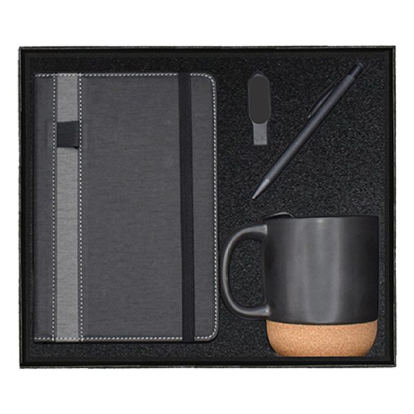Premium gift set with a notebook, pen, and ceramic mug with a cork bottom.
