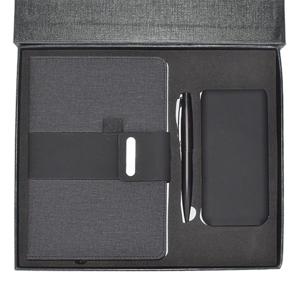 Black gift set with a notebook, pen, and portable power bank, designed for corporate gifts and professional use