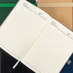 Premium A5 hard cover PU notebook in with customizable metal plate bookmark, ideal for corporate gifting and branding in UAE