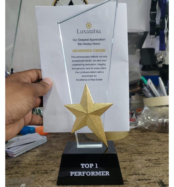 Crystal trophy with metal star for corporate awards in Dubai UAE