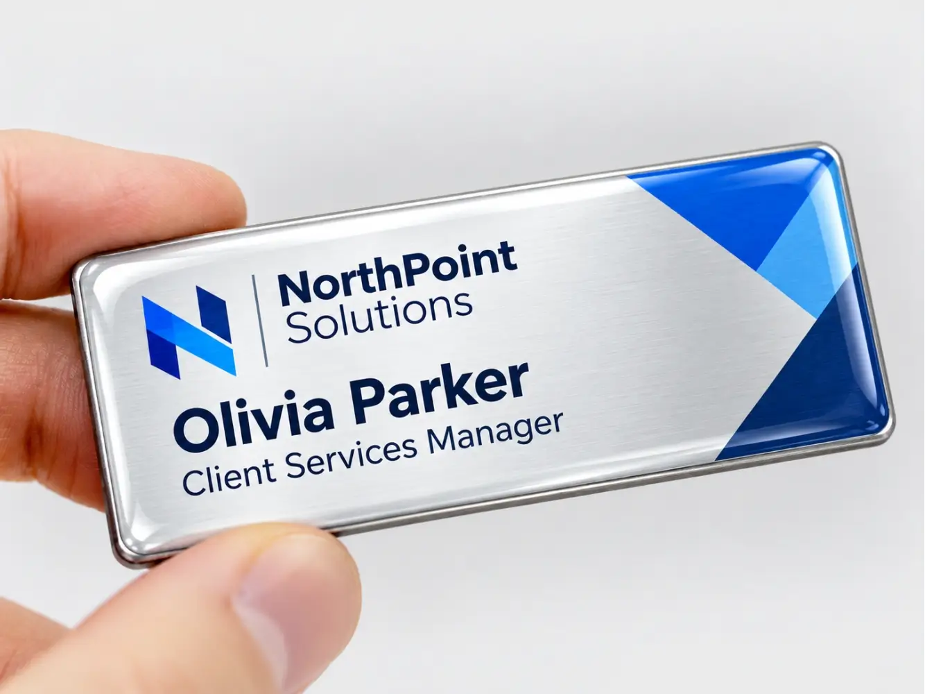 Custom epoxy dome name badges with branded logos for businesses in Dubai UAE