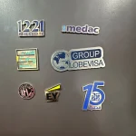 Color filled corporate logo lapel pins with magnetic backing UAE