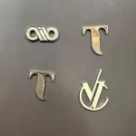 Custom silver logo lapel pin with magnetic backing Dubai
