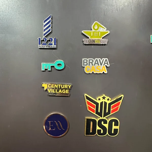 Custom stainless steel magnetic lapel pins with company logos Dubai