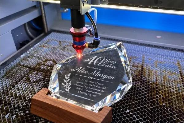 Custom engraved crystal award with company logo